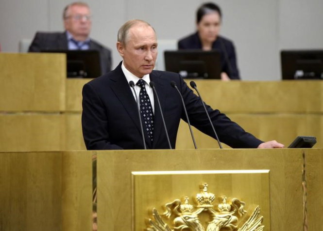 Russian President Vladimir Putin delivers a speech during the opening session of the newly-elected State Duma, the lower house of parliament, in Moscow, Russia, October 5, 2016. Sputnik/Kremlin/Alexei Nikolskyi via REUTERS