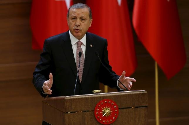 Turkish President Tayyip Erdogan makes a speech during his meeting with mukhtars at the Presidential Palace in Ankara, Turkey, November 26, 2015. REUTERS/Umit Bektas